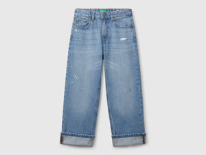 Jeans straight con rotture