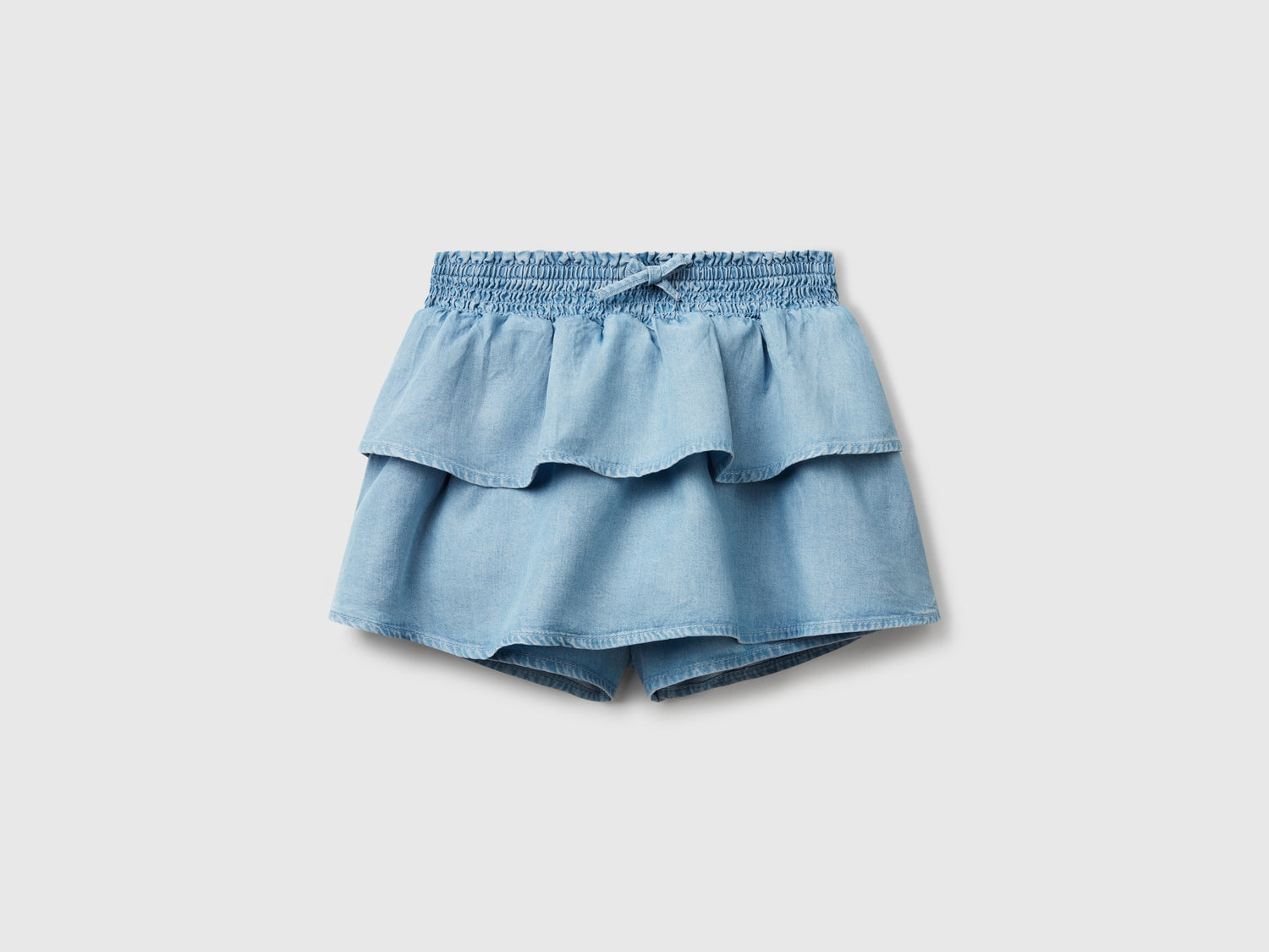 Minigonna in chambray con balze da bambina azzurro | Benetton Outlet
