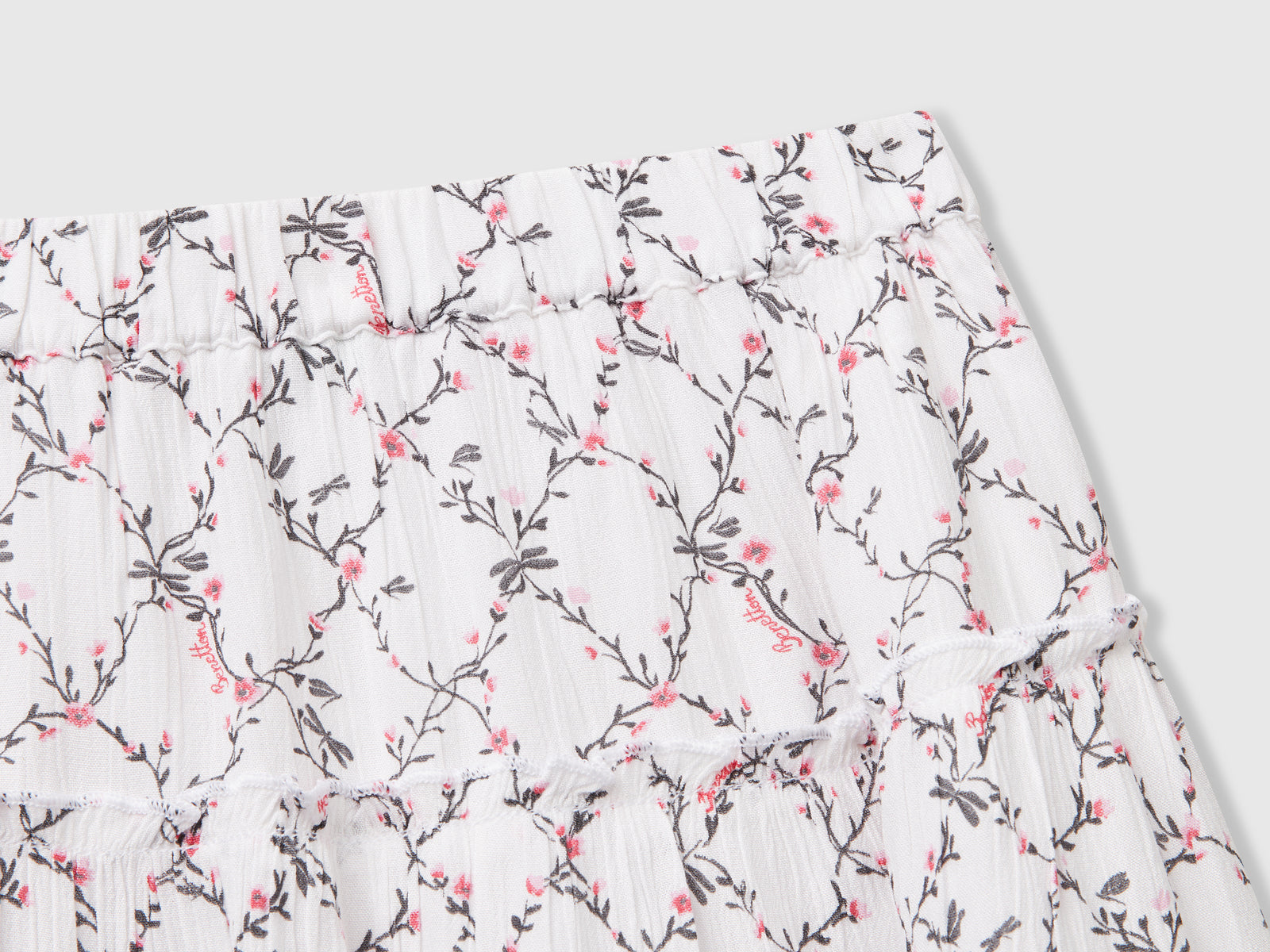Minigonna a fiori con balze da bambina bianco 3 | Benetton Outlet