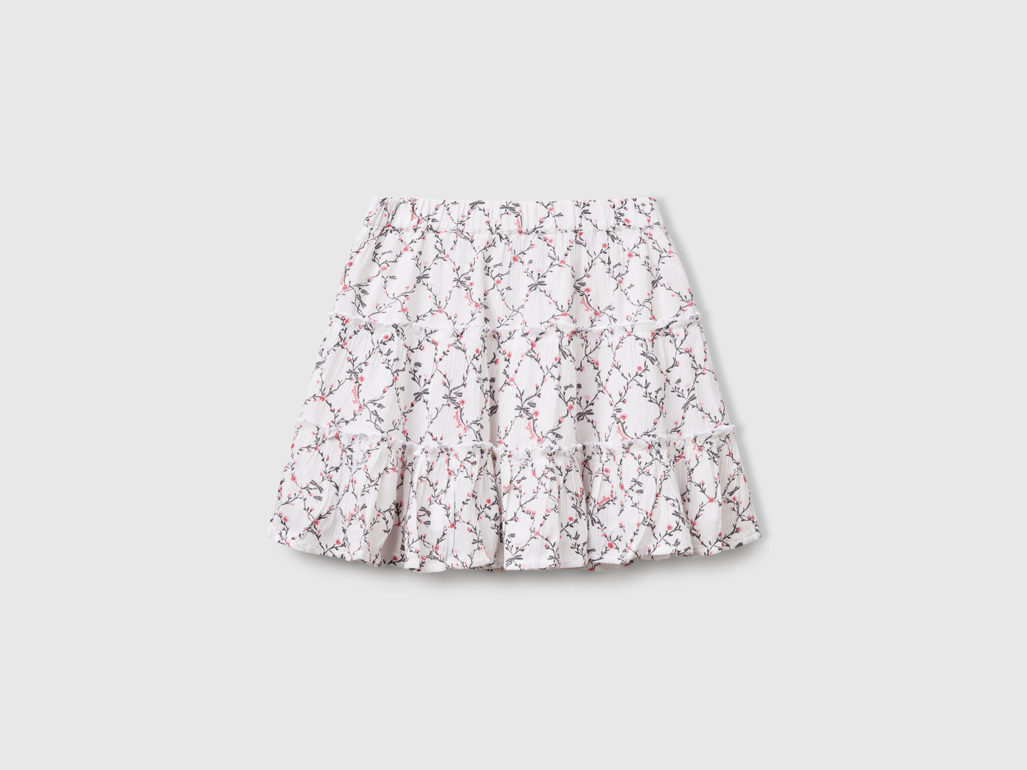 Minigonna a fiori con balze da bambina bianco | Benetton Outlet