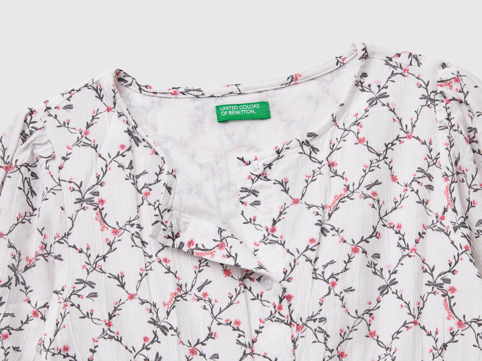 Abito fluido a fiori da bambina bianco 3 | Benetton Outlet