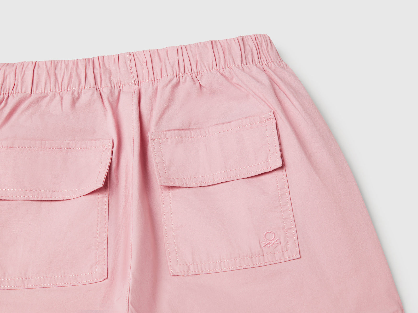 Pantaloni cargo in cotone stretch da bambina rosa 3 | Benetton Outlet