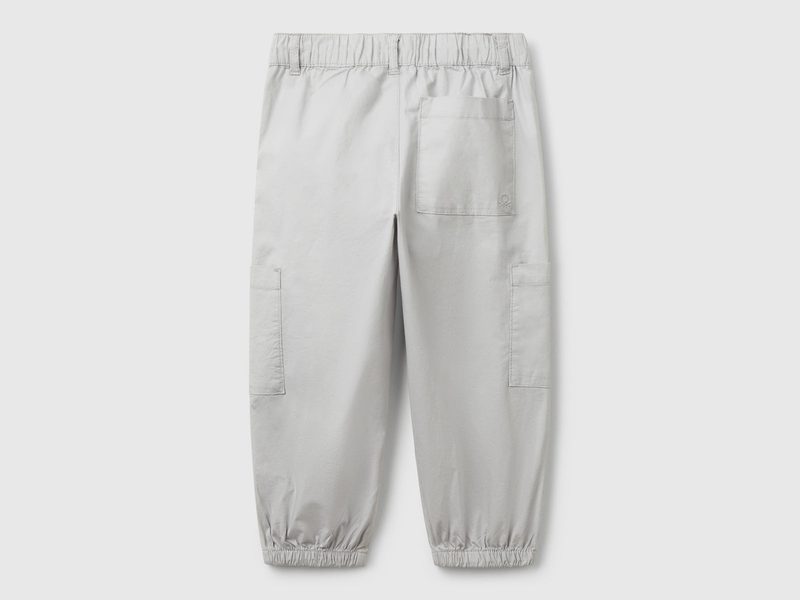 Pantaloni parachute in cotone stretch da bimbo grigio 2 | Benetton Outlet