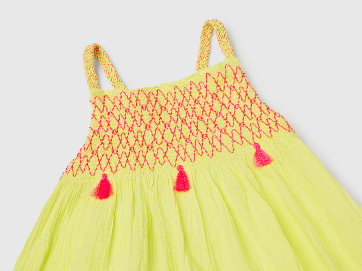 Vestito con nappine fluo
