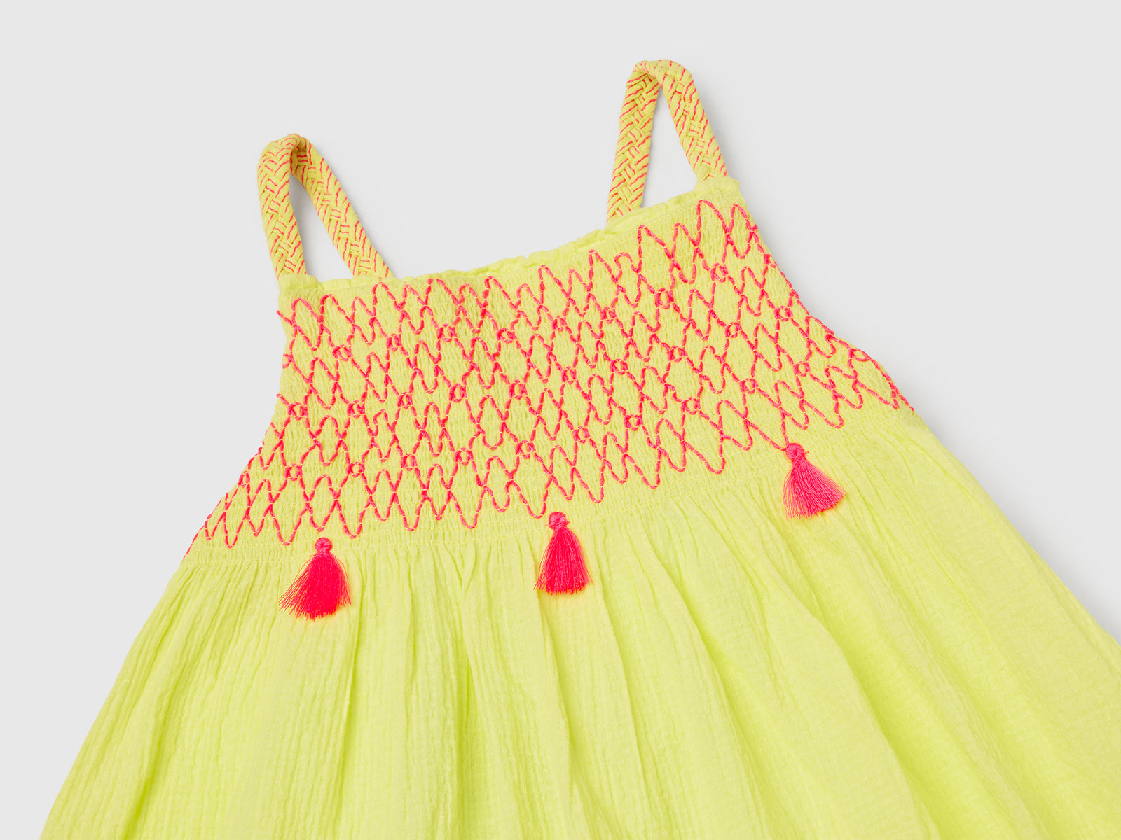 Vestito con nappine fluo da bimba giallo 3 | Benetton Outlet