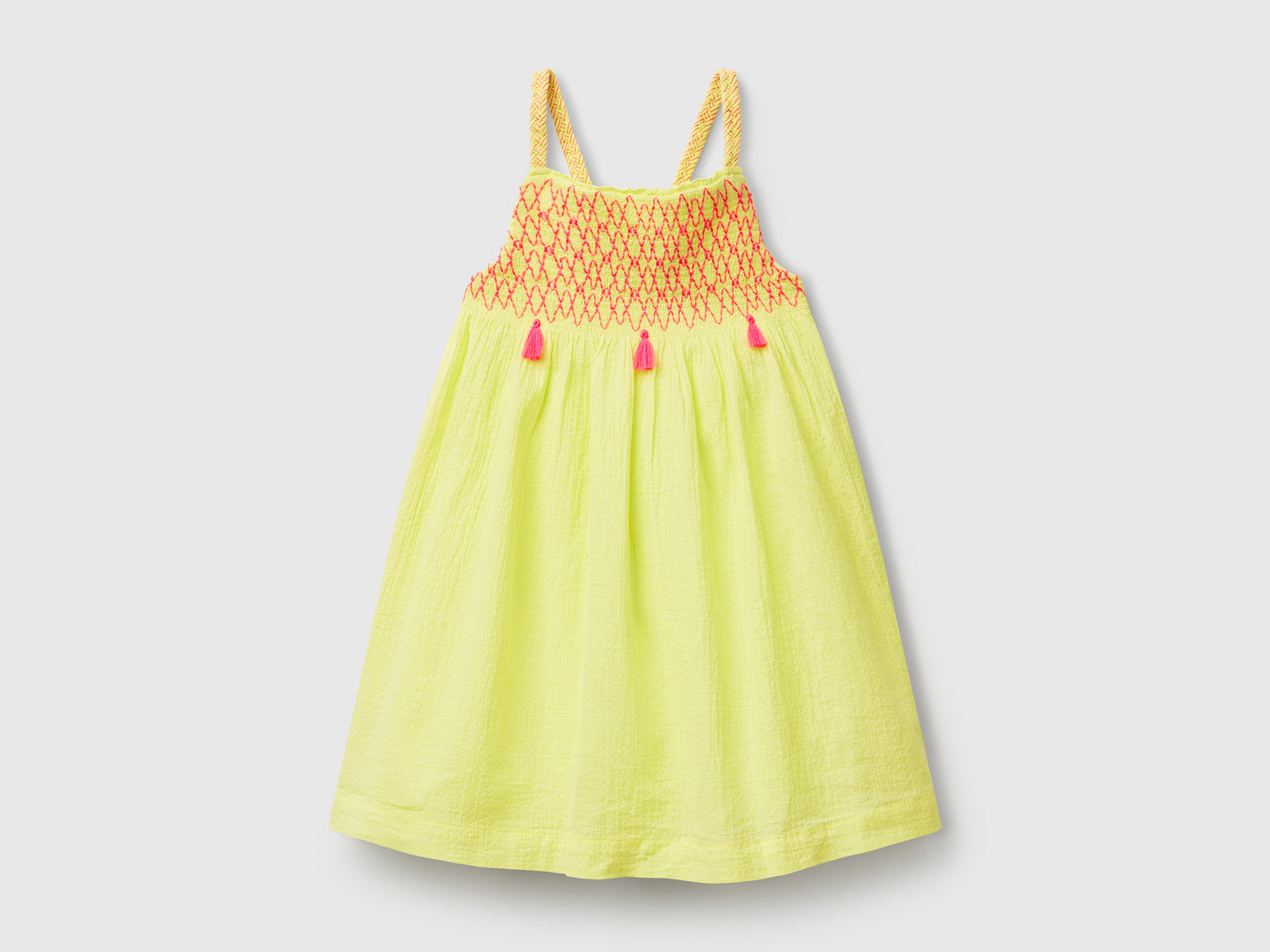Vestito con nappine fluo da bimba giallo | Benetton Outlet