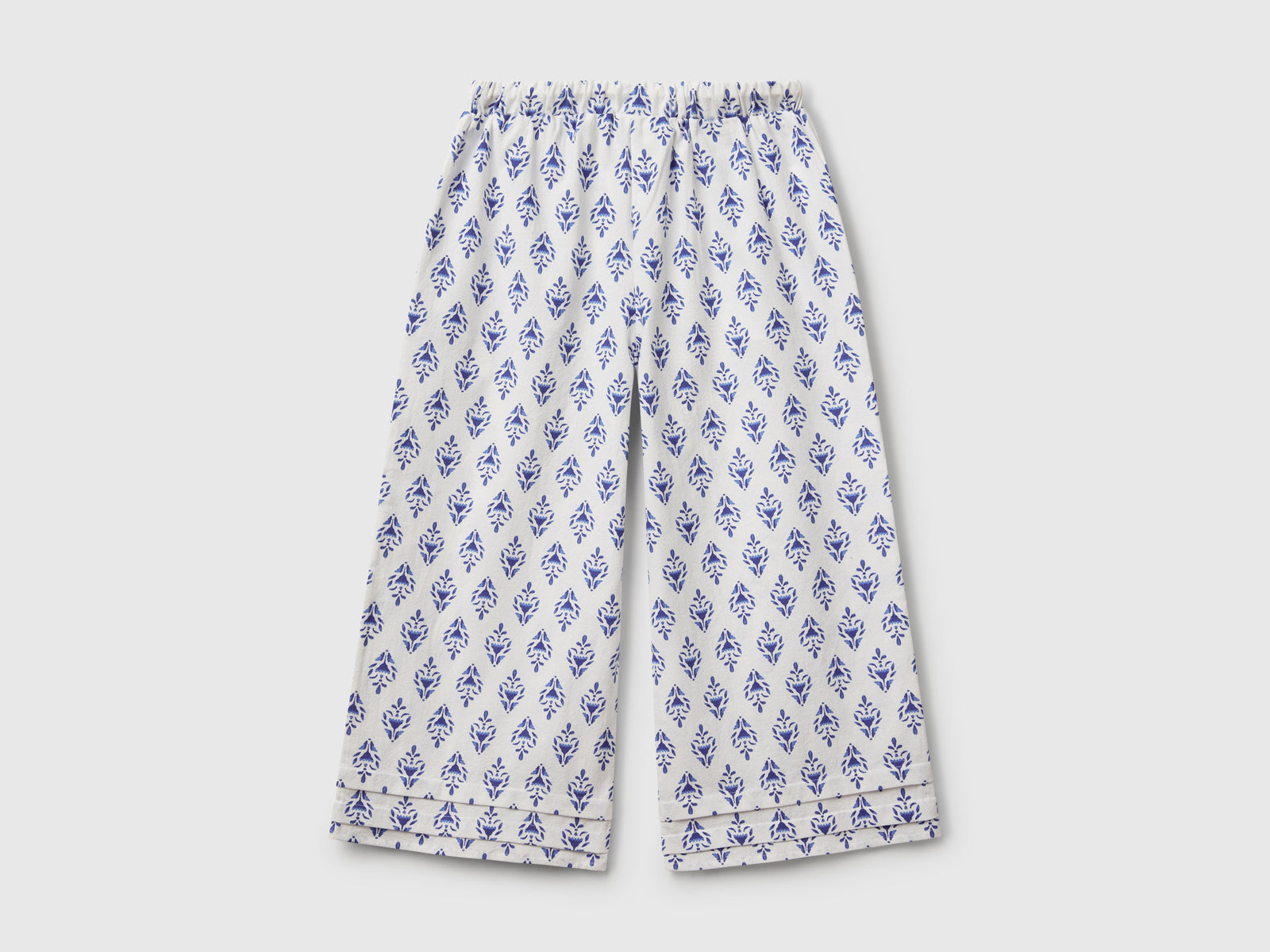 Pantaloni fantasia con gamba ampia da bambina blu 2 | Benetton Outlet