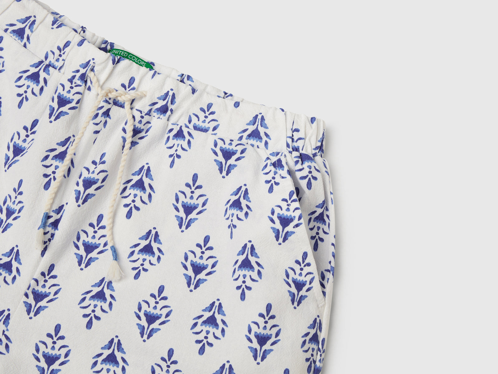 Pantaloni fantasia con gamba ampia da bambina blu 3 | Benetton Outlet