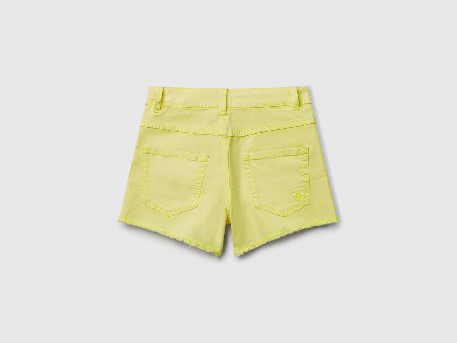 Shorts cinque tasche da bambina giallo fluo 2 | Benetton Outlet