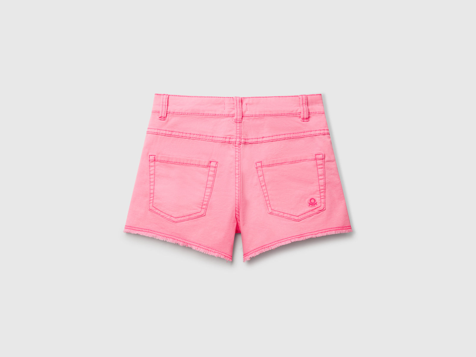 Shorts cinque tasche da bambina rosa fluo 2 | Benetton Outlet
