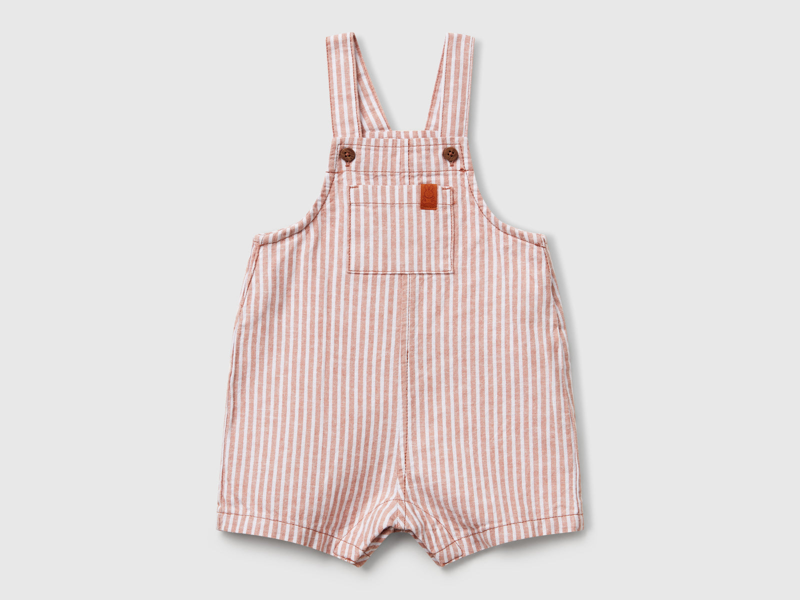 Salopette a righe in misto lino da neonato rosso | Benetton Outlet