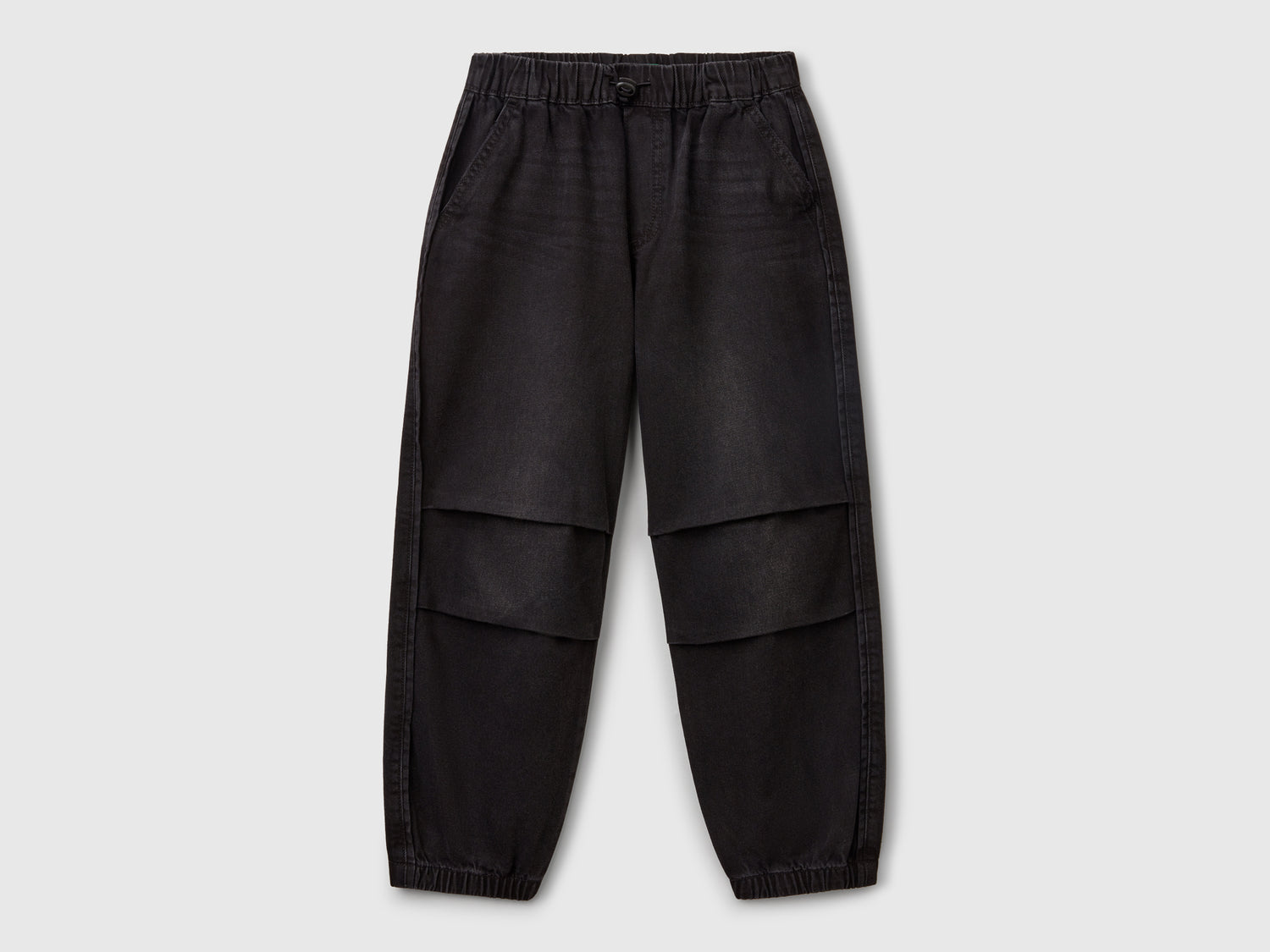 Jeans parachute da bambino nero | Benetton Outlet