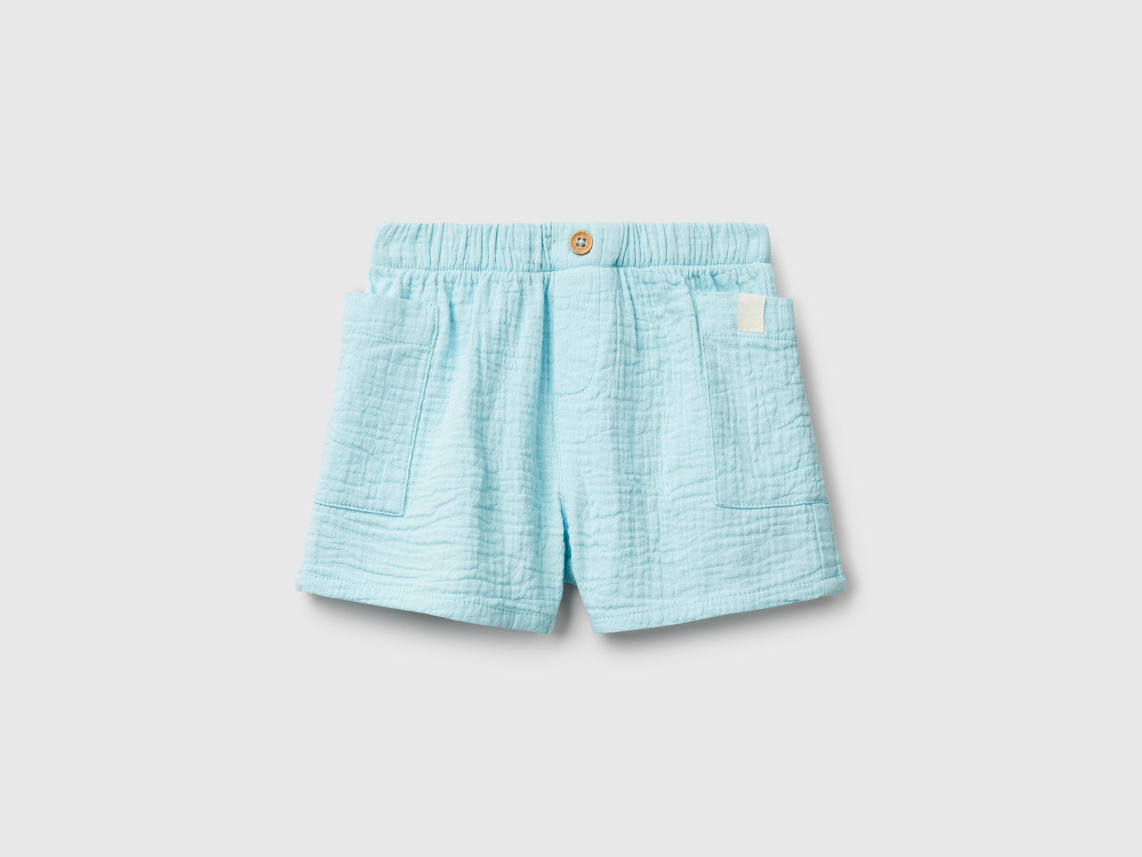 Shorts con tasche da neonato azzurro | Benetton Outlet
