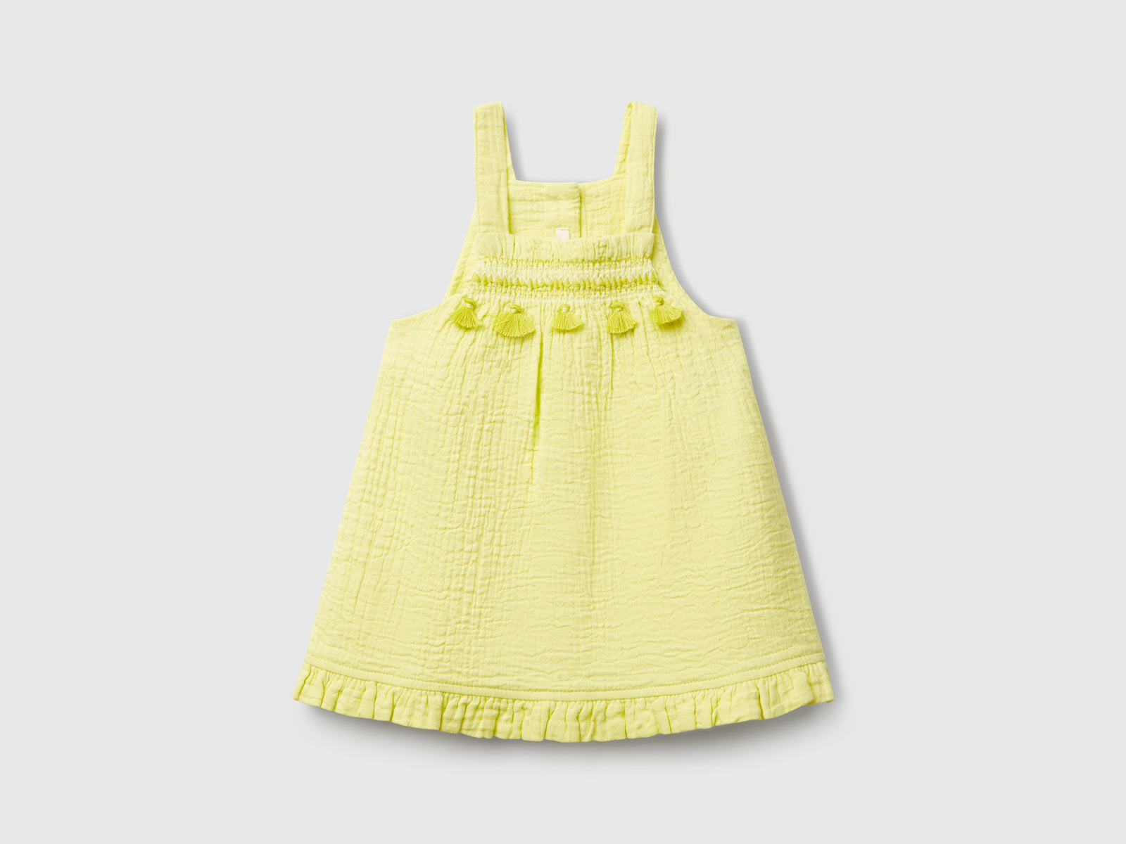 Gonna salopette con nappine da neonato lime | Benetton Outlet