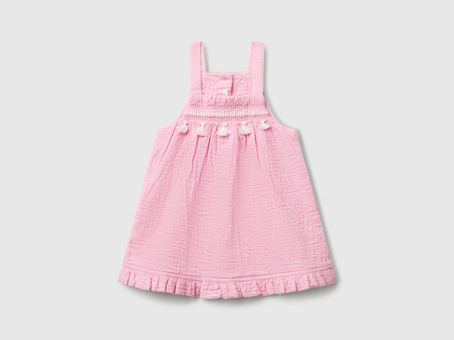Gonna salopette con nappine da neonato rosa | Benetton Outlet