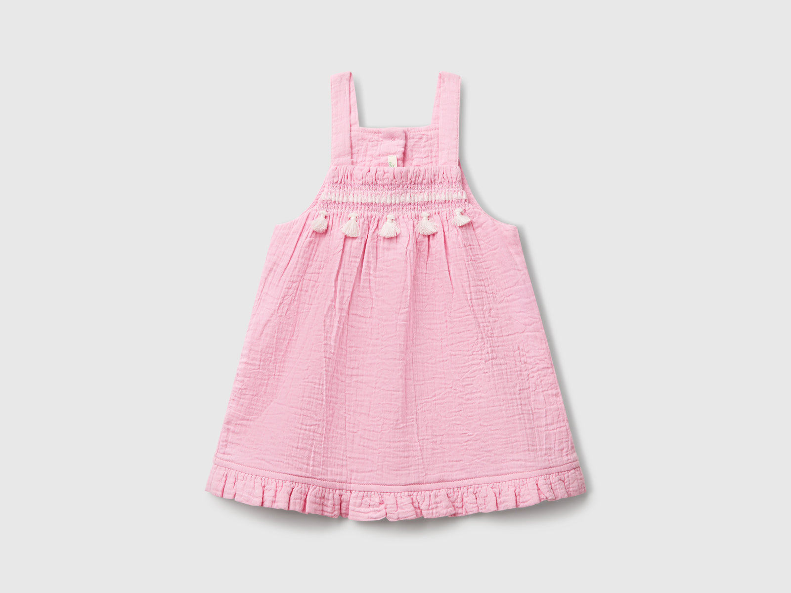 Gonna salopette con nappine da neonato rosa | Benetton Outlet