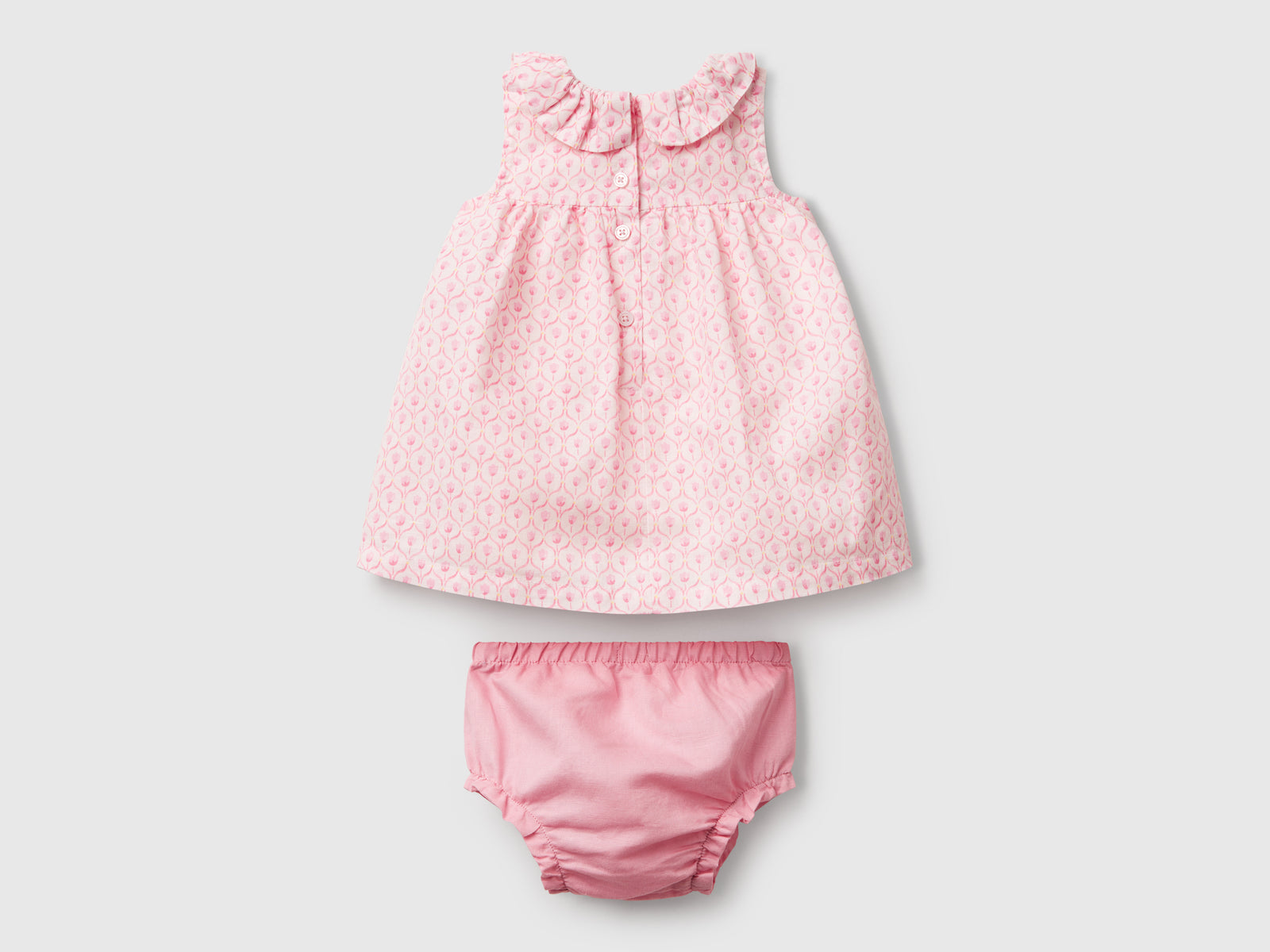 Abito con collo volant da neonato rosa pastello 2 | Benetton Outlet