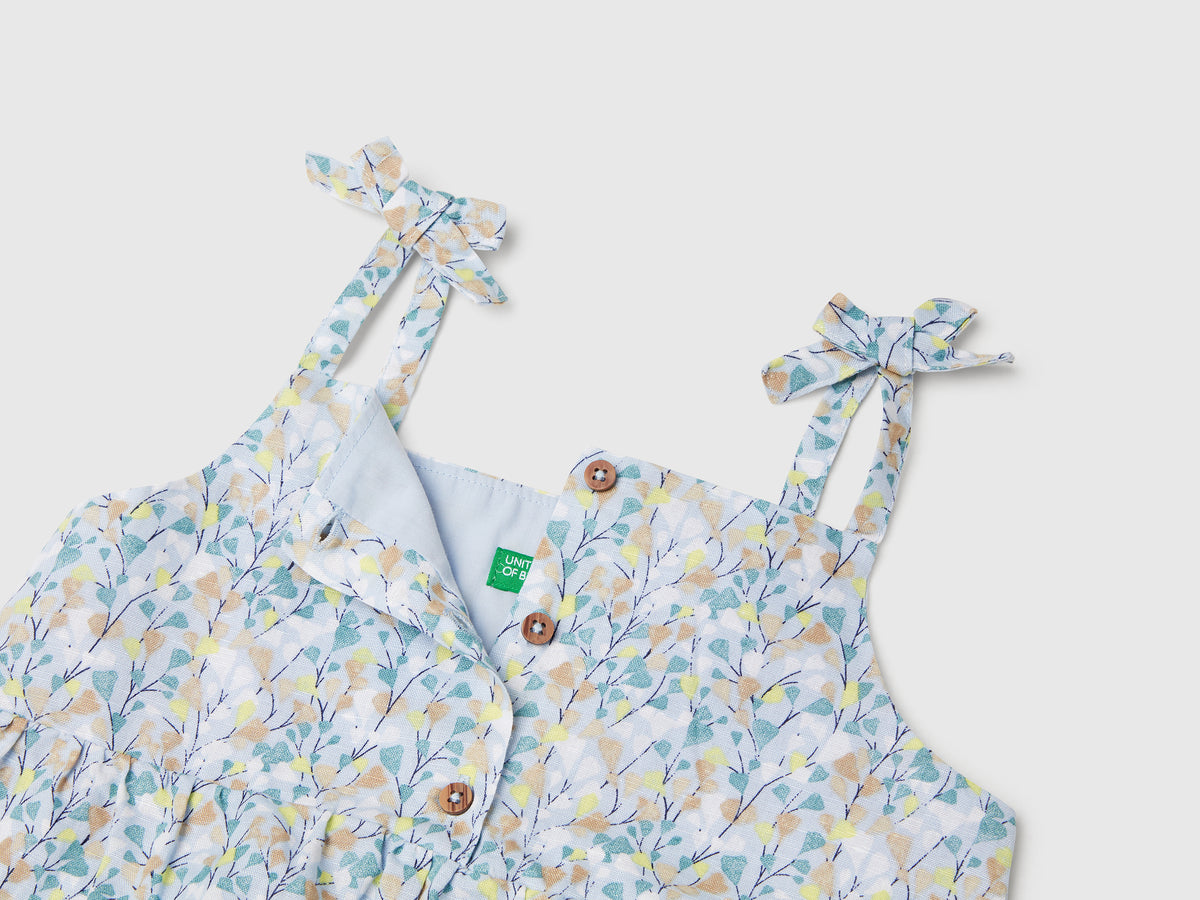 Abito a balze con stampa fiori