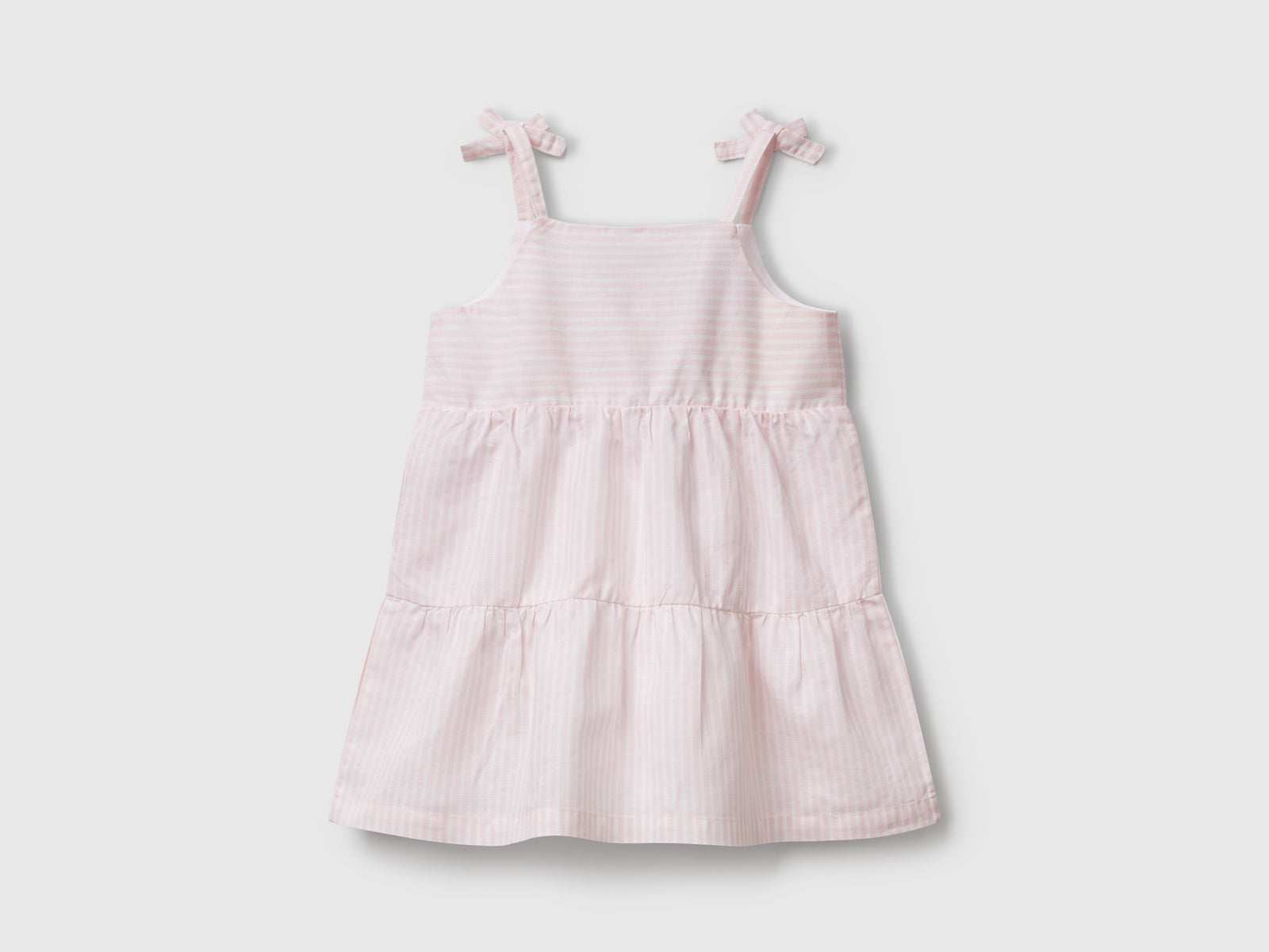 Abito a balze con stampa a righe da bimba rosa 2 | Benetton Outlet