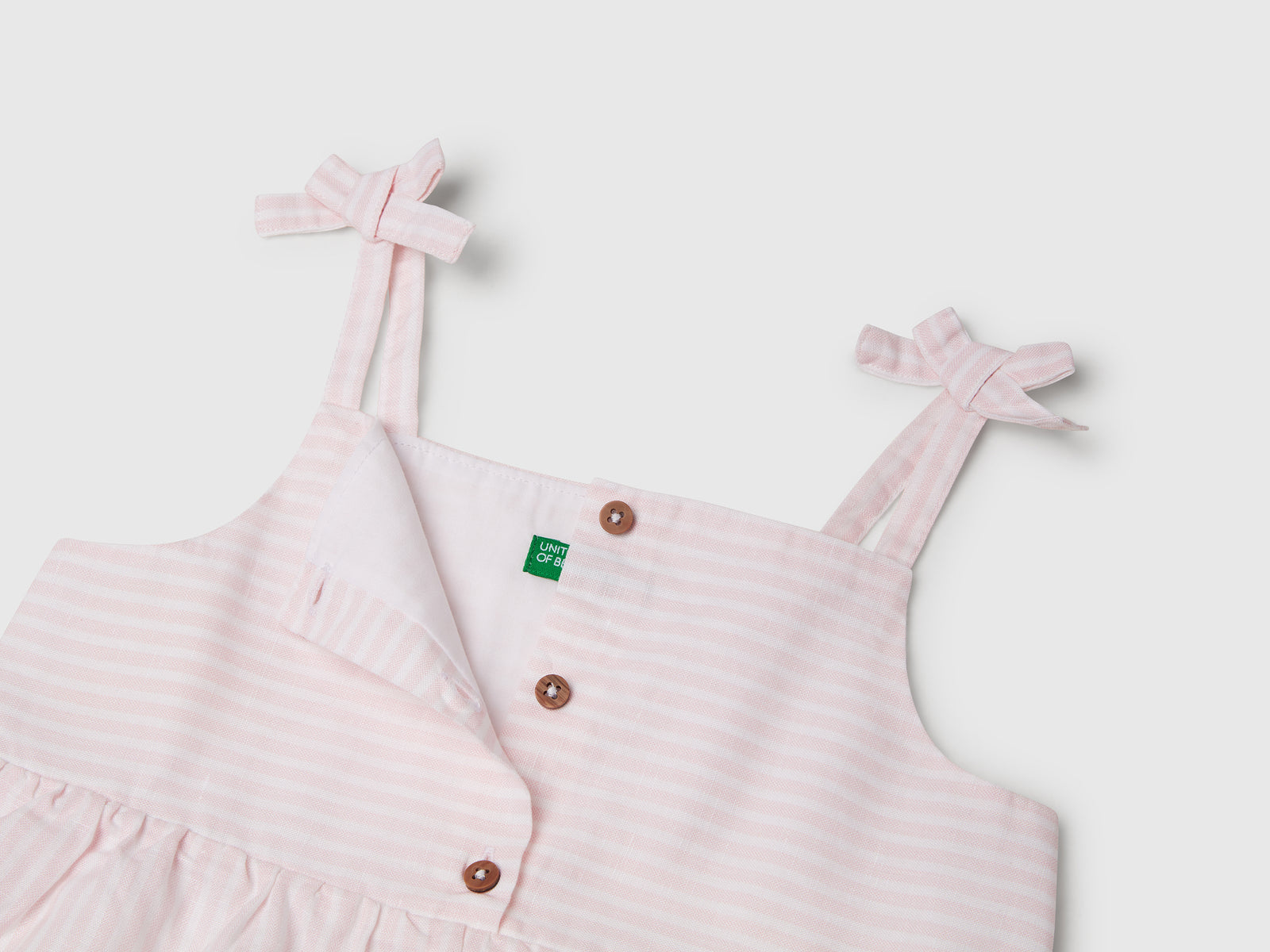 Abito a balze con stampa a righe da bimba rosa 3 | Benetton Outlet
