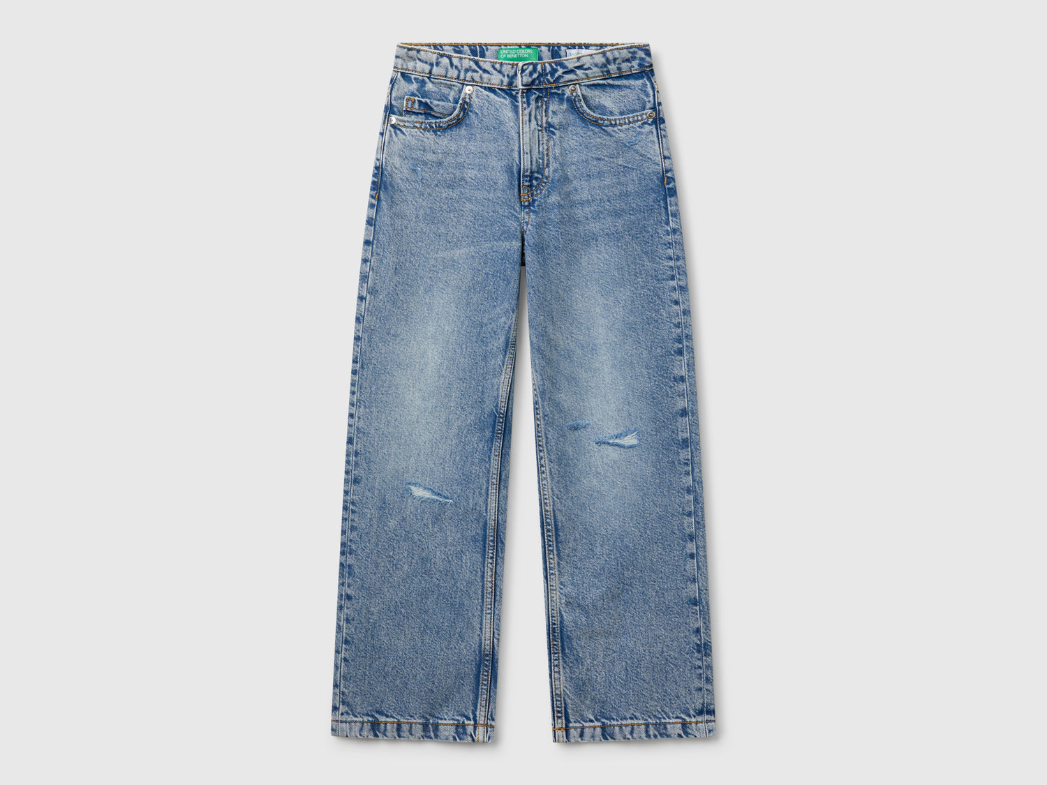 Jeans straight con rotture da bambina azzurro | Benetton Outlet