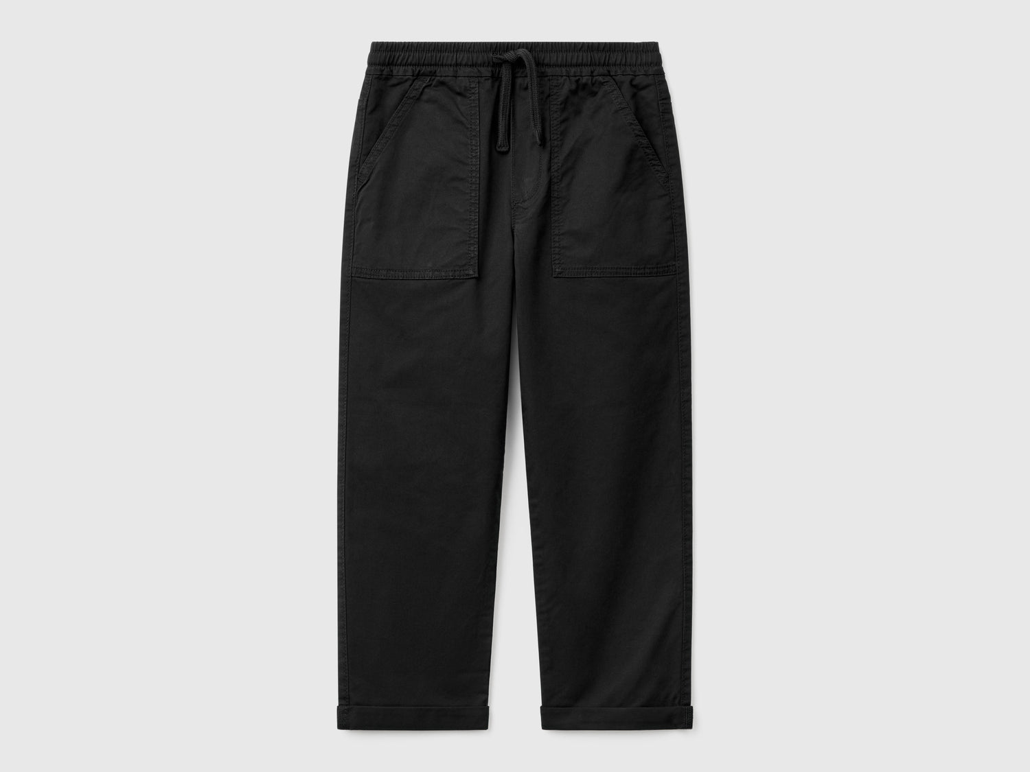 Joggers in cotone stretch con coulisse da bambino nero | Benetton Outlet