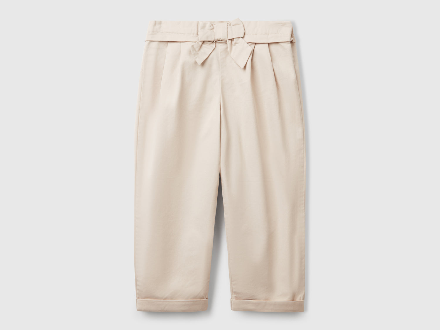 Pantaloni con fiocco da bimba beige | Benetton Outlet