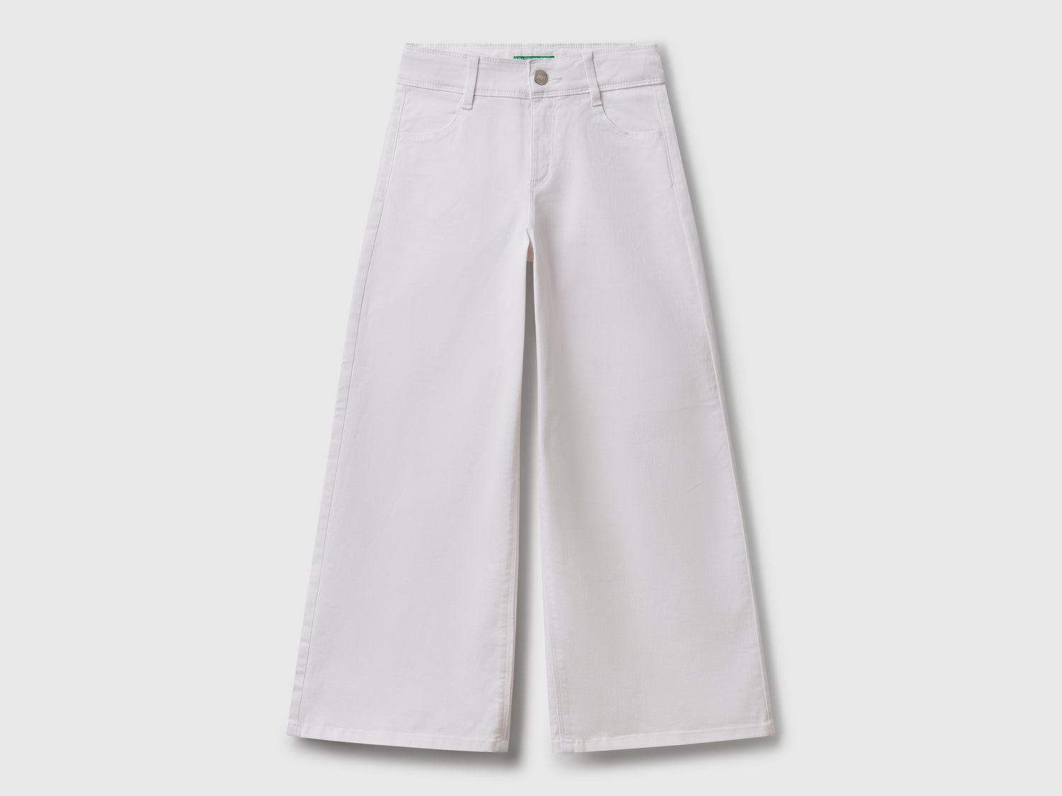 Pantaloni con gamba ampia da bambina bianco | Benetton Outlet