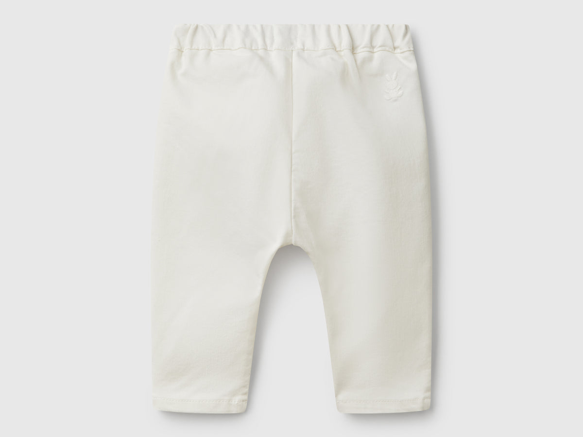 Pantaloni stretch con coulisse