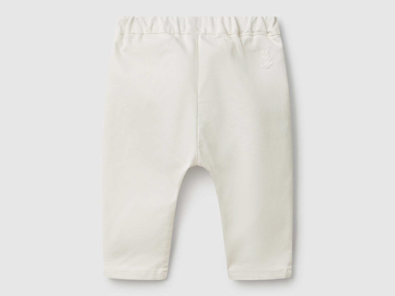 Pantaloni stretch con coulisse da neonato bianco panna 2 | Benetton Outlet