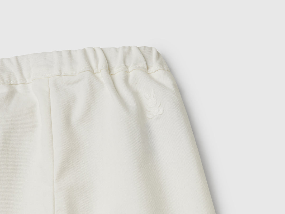 Pantaloni stretch con coulisse