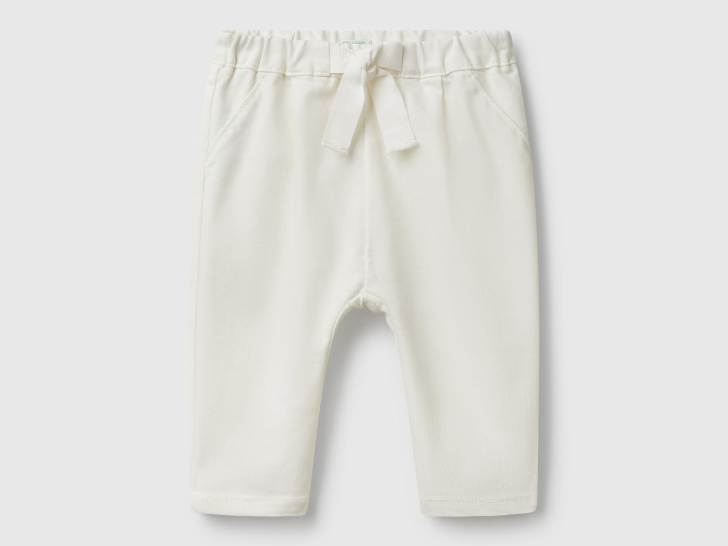 Pantaloni stretch con coulisse da neonato bianco panna | Benetton Outlet