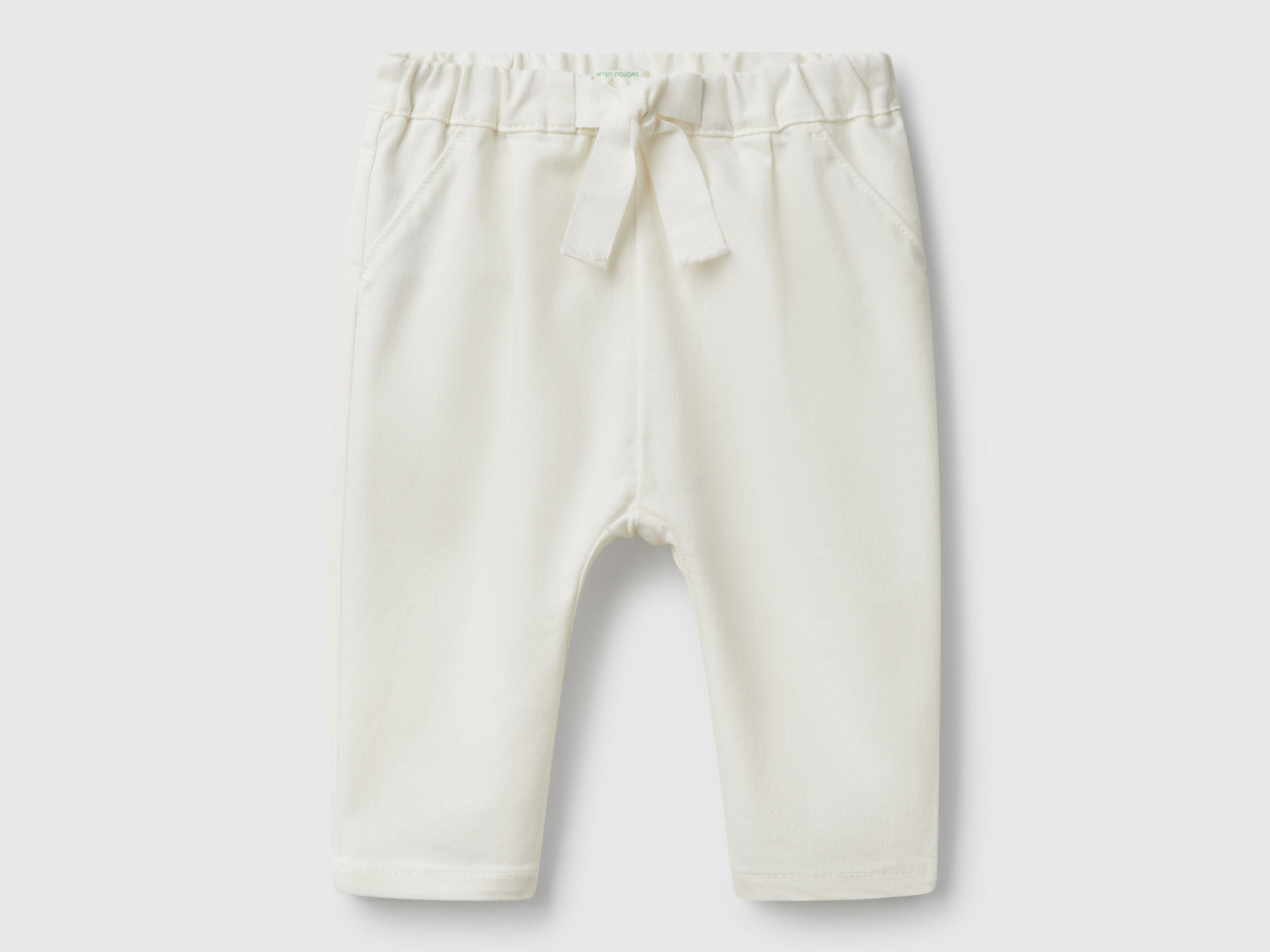 Pantaloni stretch con coulisse da neonato bianco panna | Benetton Outlet