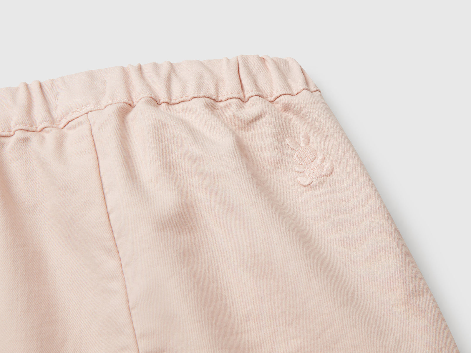 Pantaloni stretch con coulisse da neonato rosa tenue 3 | Benetton Outlet