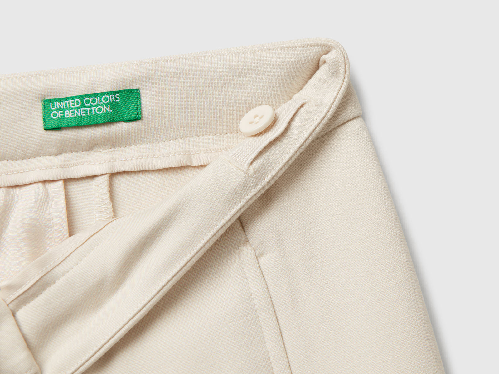Pantaloni eleganti da bambina bianco panna 3 | Benetton Outlet