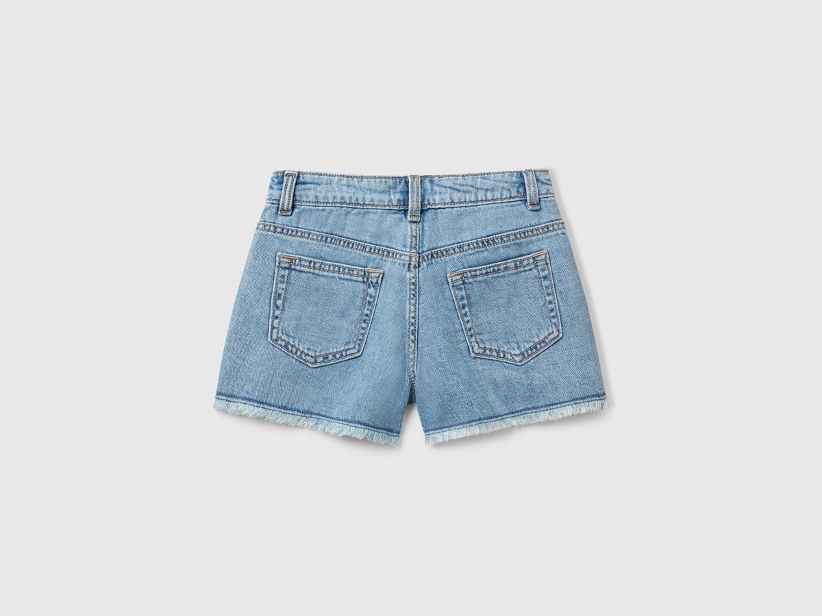 Shorts di jeans con ricami floreali