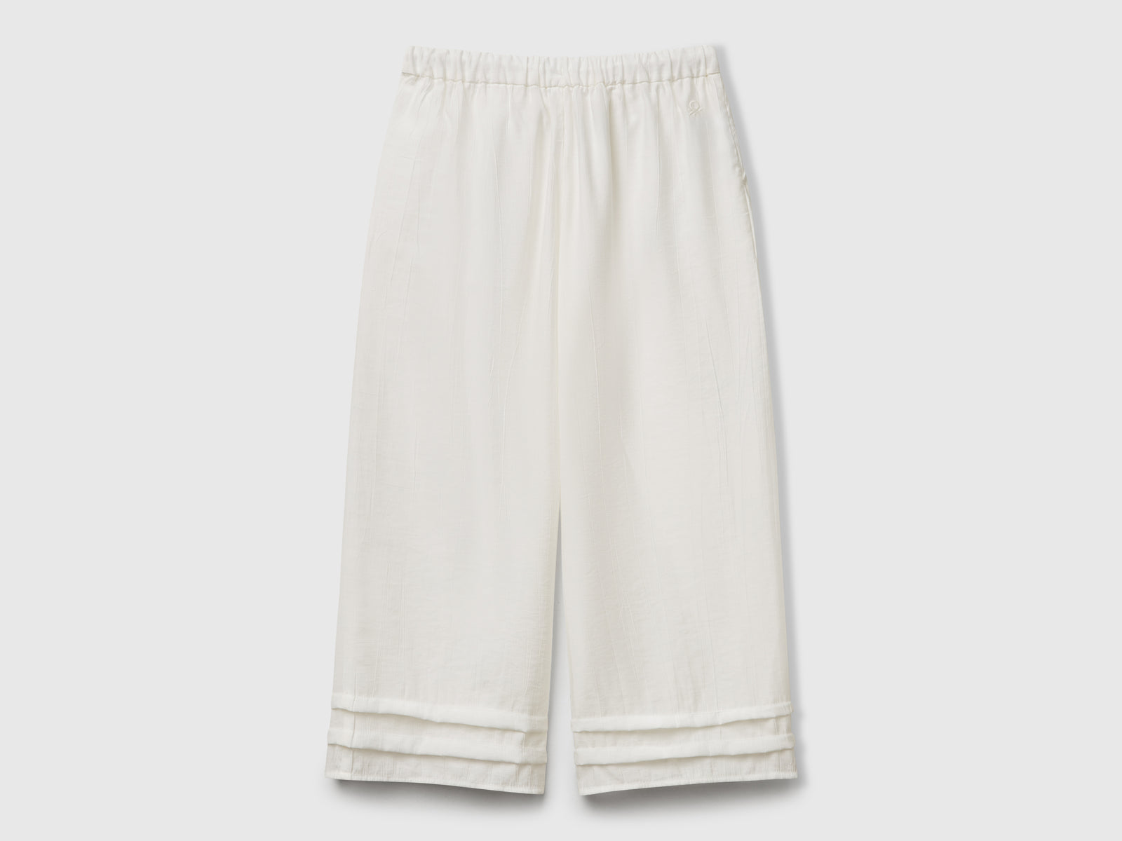 Pantaloni in misto viscosa da bambina bianco panna 2 | Benetton Outlet
