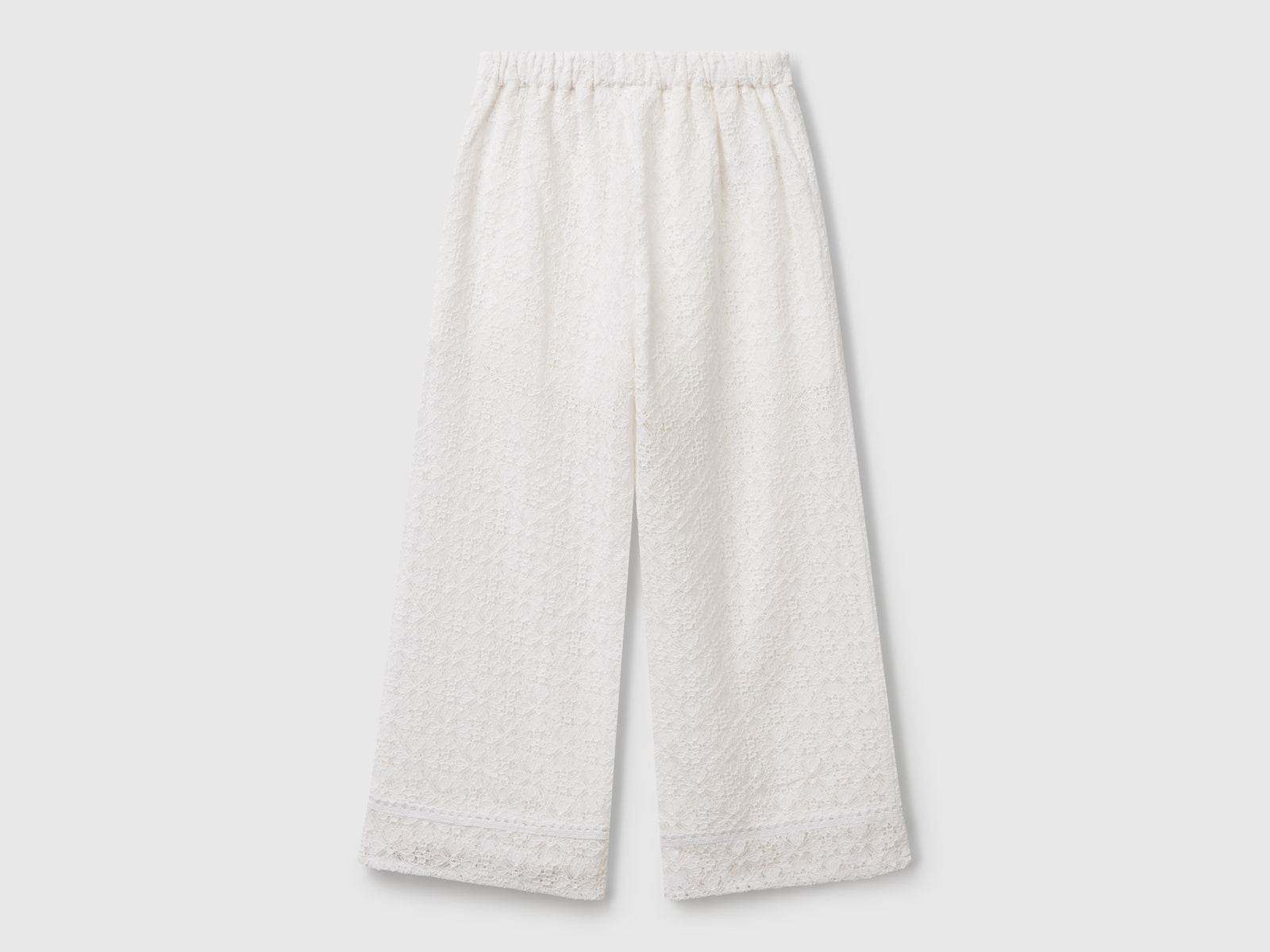 Pantaloni ampi in pizzo da bambina bianco panna 2 | Benetton Outlet