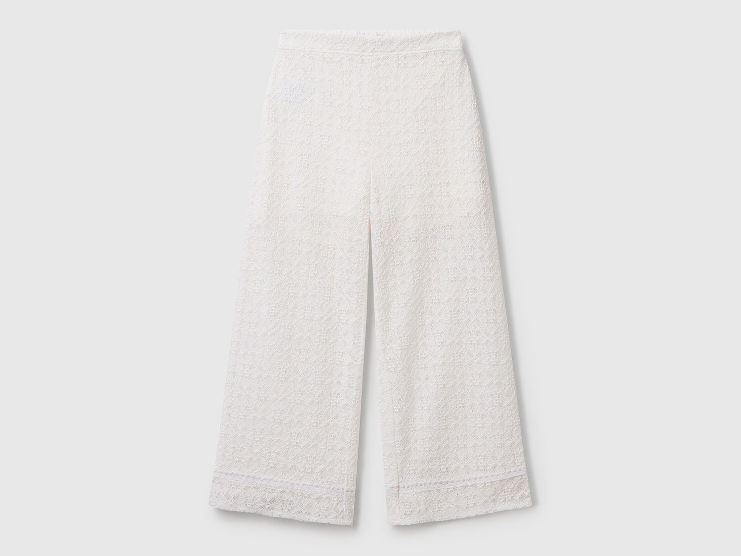 Pantaloni ampi in pizzo da bambina bianco panna | Benetton Outlet