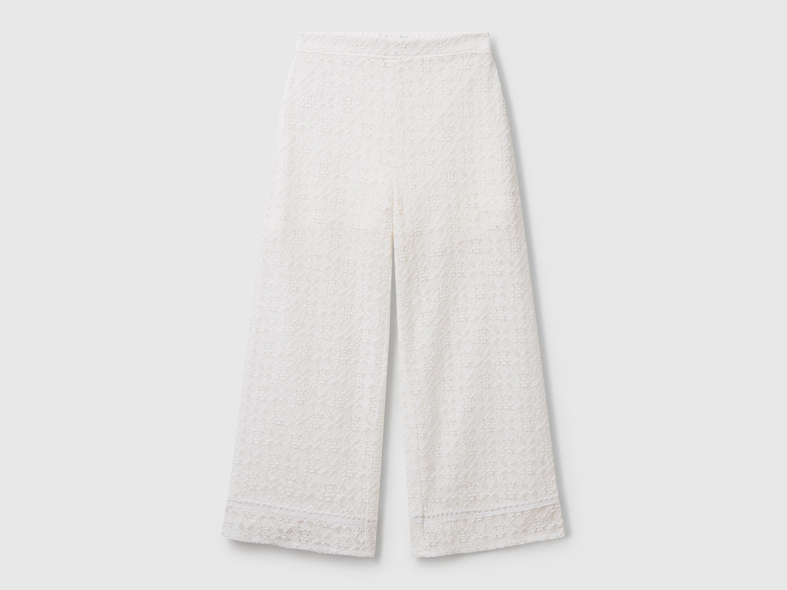 Pantaloni ampi in pizzo da bambina bianco panna | Benetton Outlet