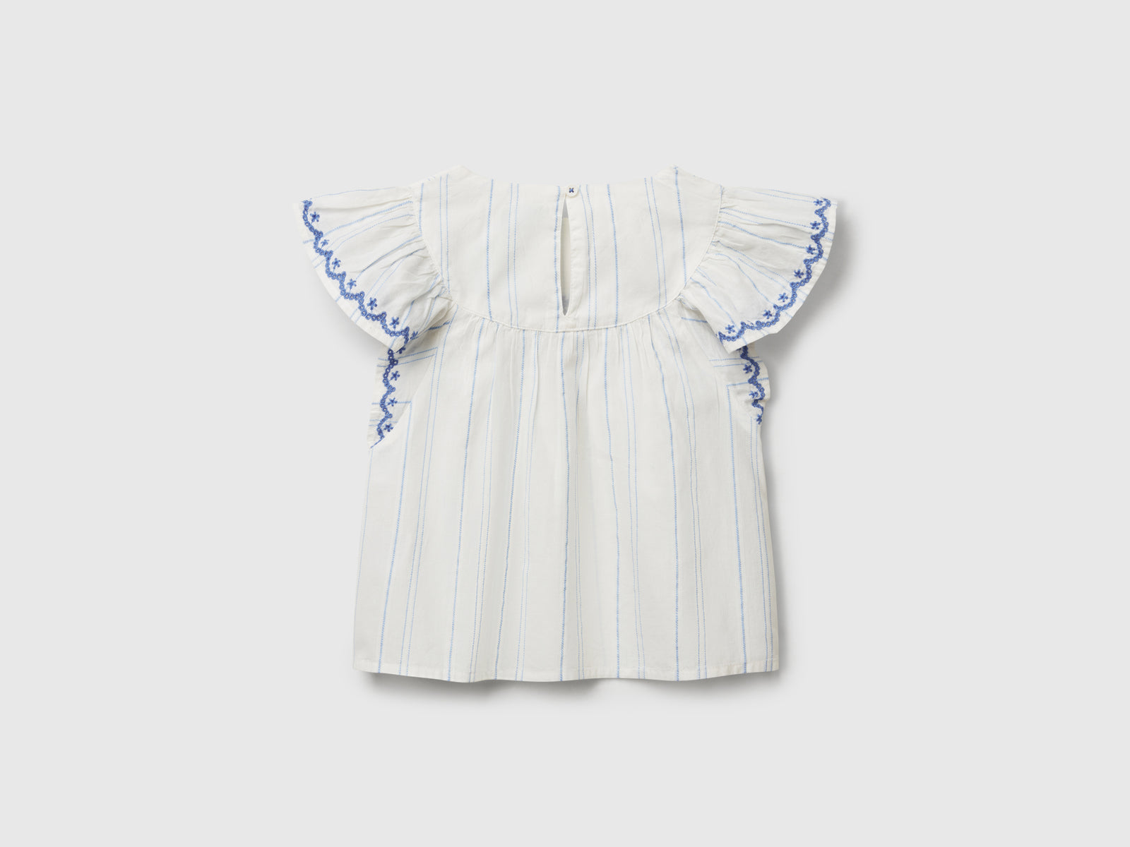 Blusa con ricami floreali da bimba bianco panna 2 | Benetton Outlet