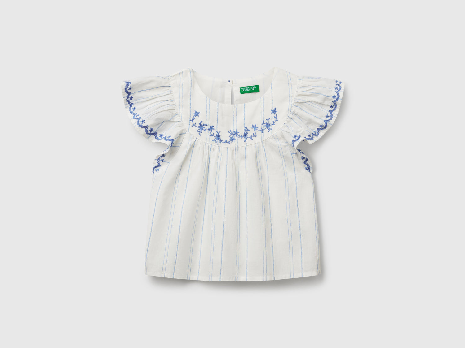 Blusa con ricami floreali da bimba bianco panna | Benetton Outlet