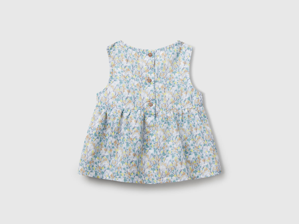 Blusa a fiori in misto lino