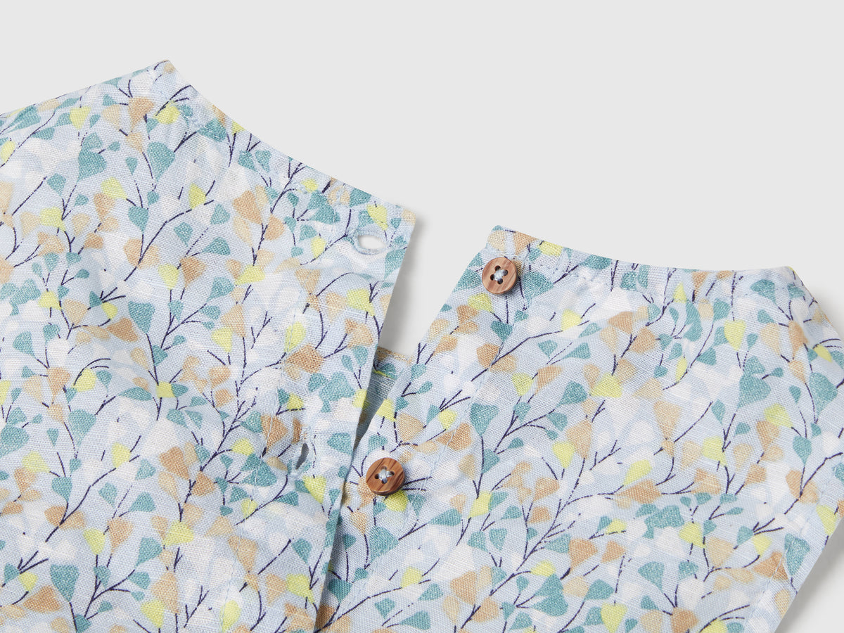 Blusa a fiori in misto lino