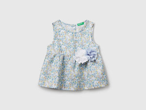 Blusa a fiori in misto lino