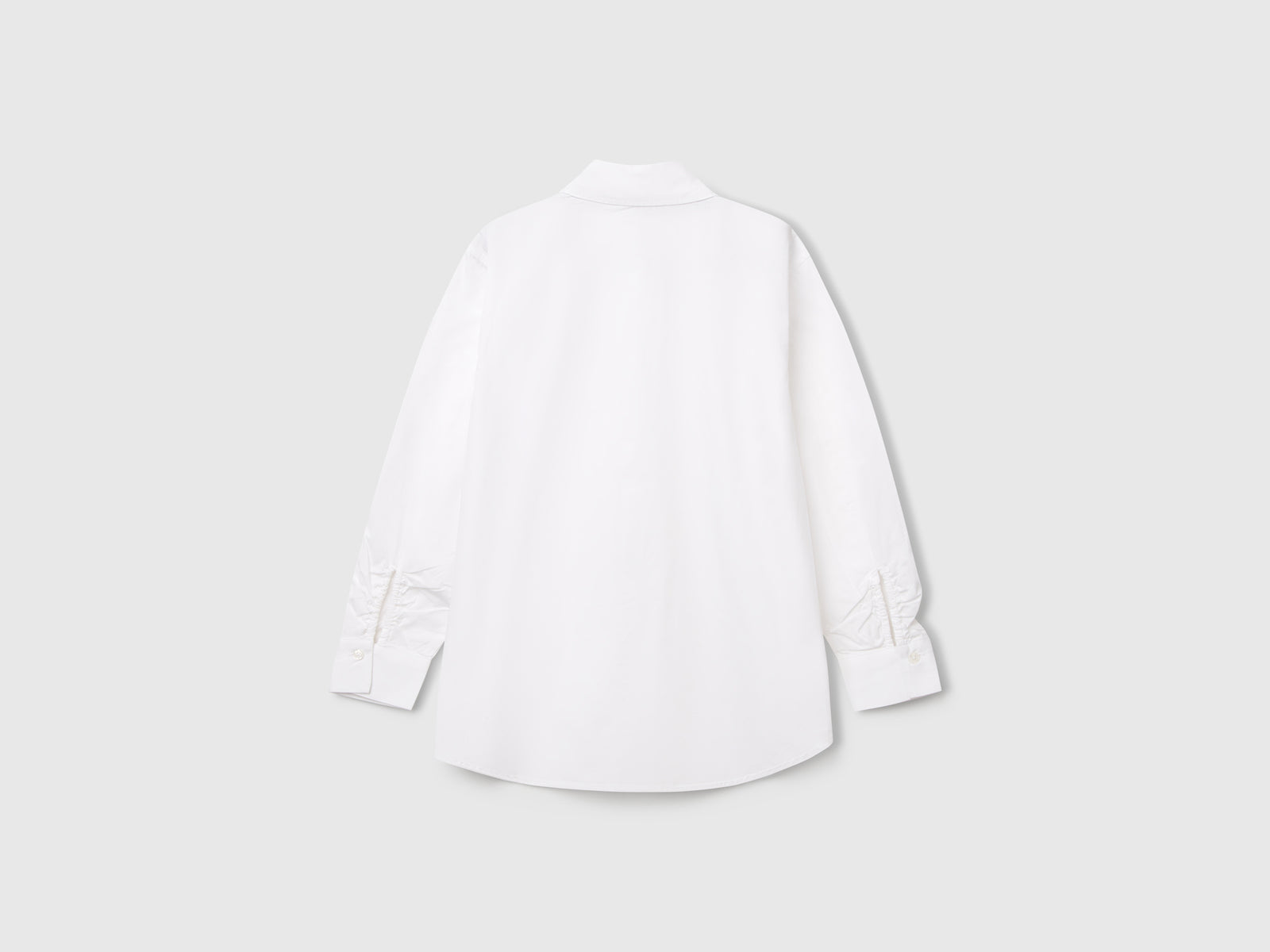 Camicia over fit da bambina bianco 2 | Benetton Outlet