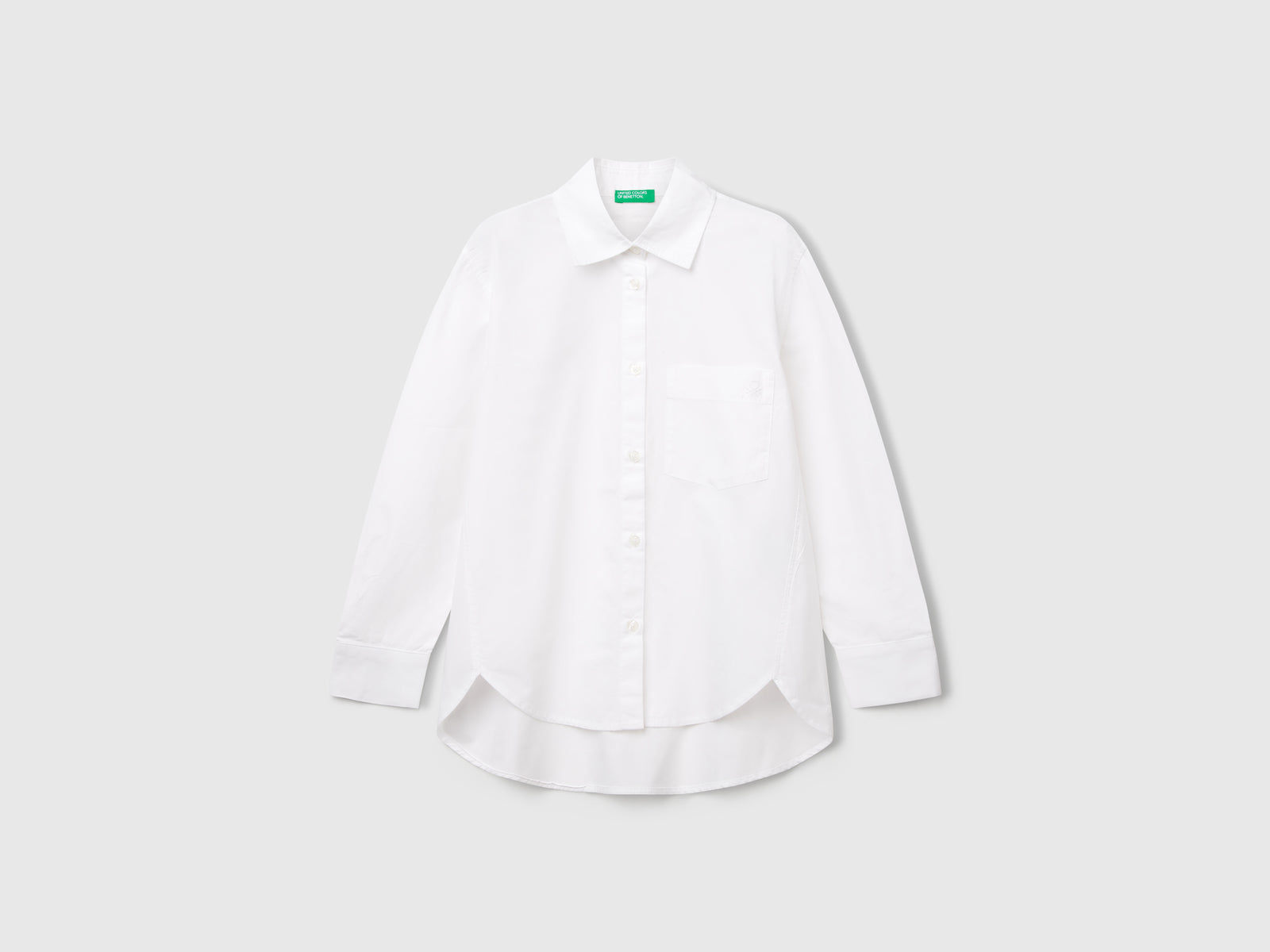 Camicia over fit da bambina bianco | Benetton Outlet
