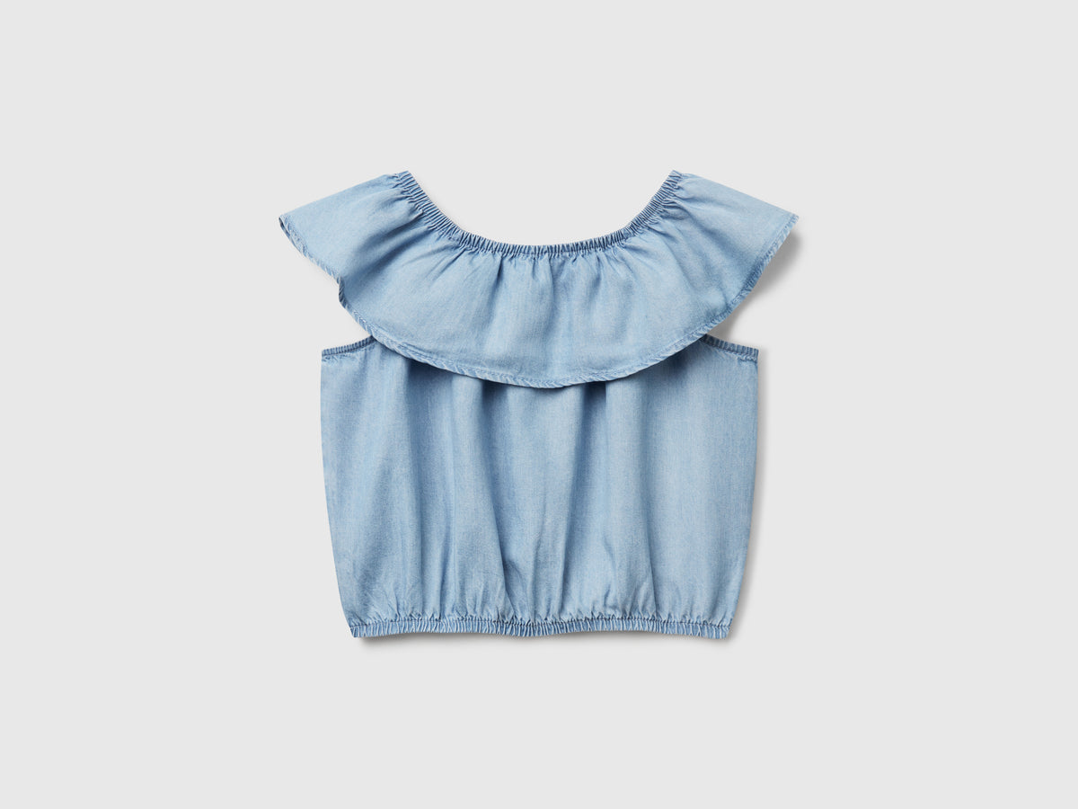 Top in chambray con volant