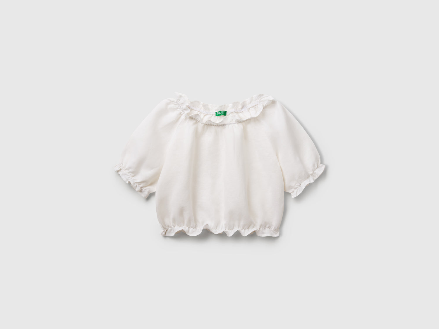 Blusa a manica corta da bambina bianco | Benetton Outlet