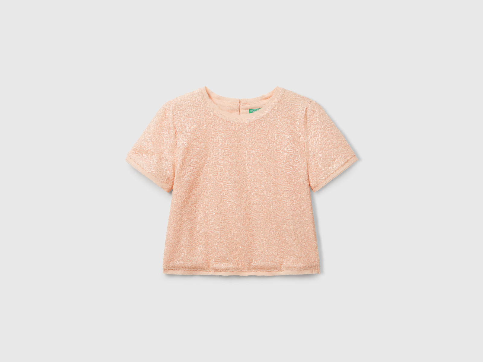 Top con paillettes da bambina rosa tenue | Benetton Outlet